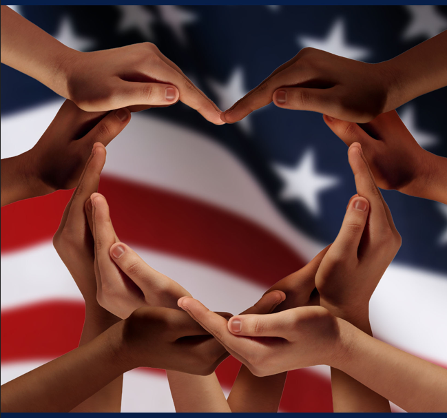 Hands of different skin tones forming a circle against an American flag background, representing unity.